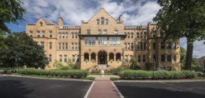 Front facade of the Western Pennsylvania School for Blind Children, sandy block building, three stories high and very wide