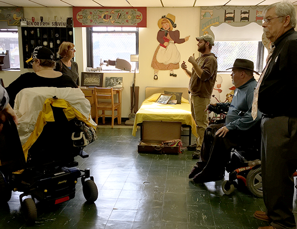 Photo of people touring in-house museum