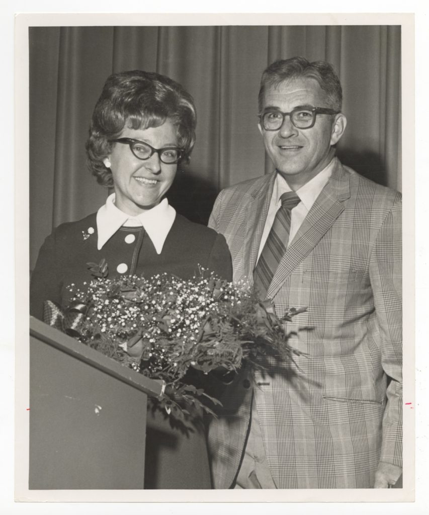 Photo shows Patricia Clapp standing at a podium at a 1971 event.