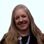 Head shot of Sierra Green, a white woman with long blond hair, wearing a black top
