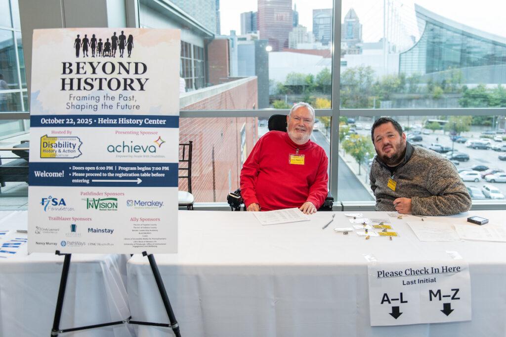 Volunteers working at the registration desk.