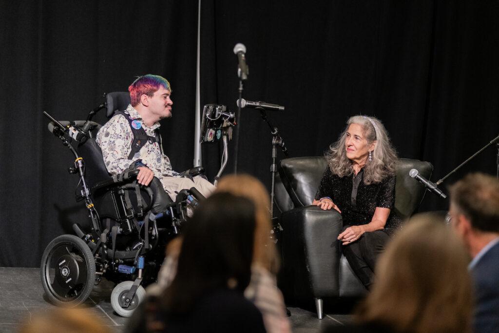 Ann Talman and Mark Steidl on stage for the main program.