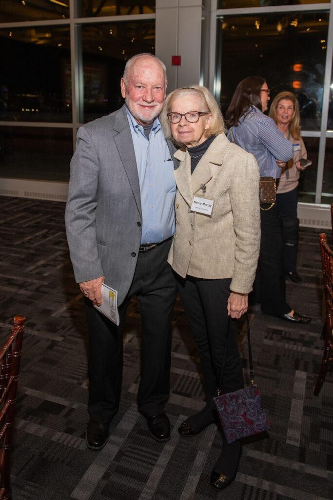 Nancy Murray poses for a photo with her husband.
